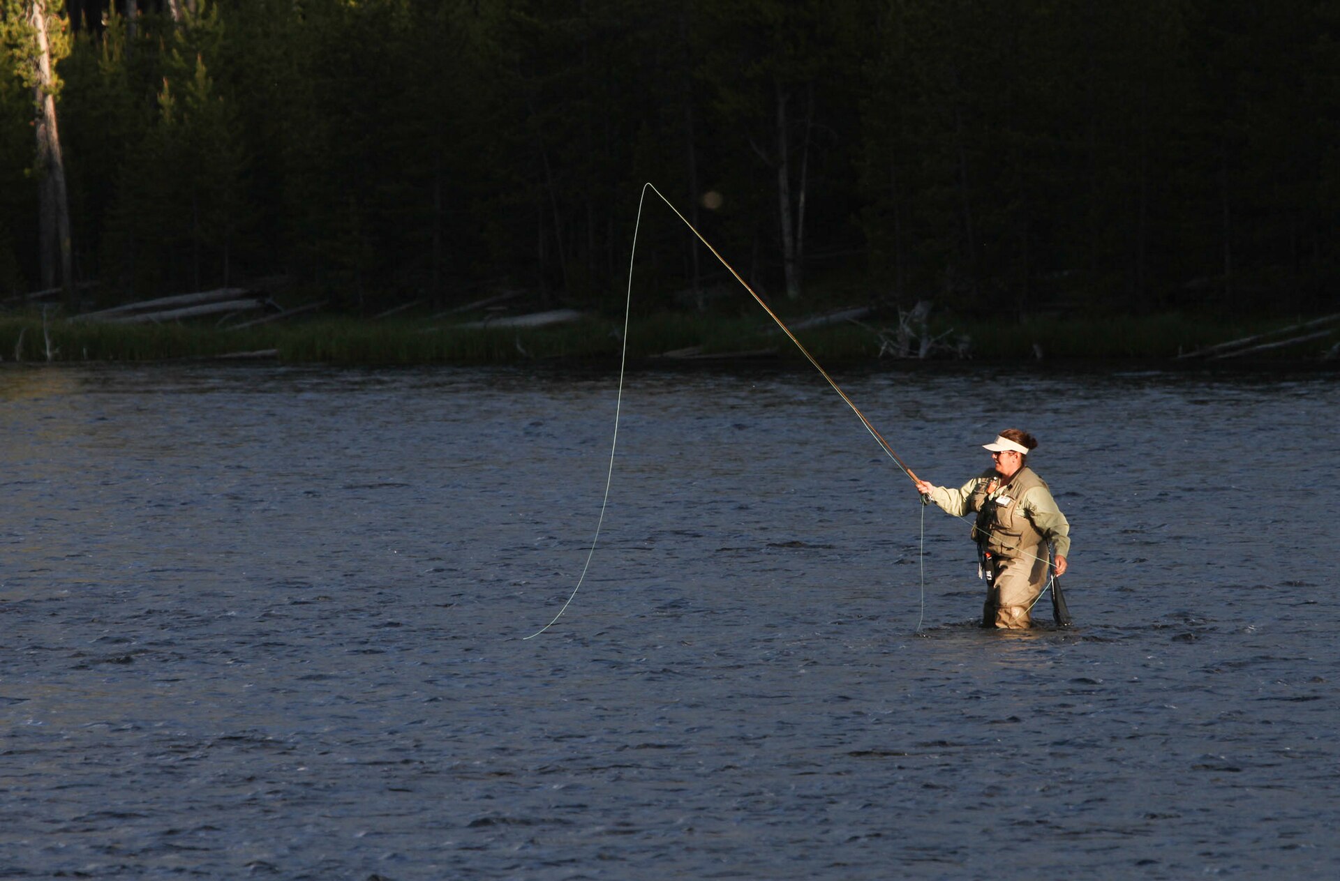 Woman fly fishing in the Firehole River (61836312 4030 4dfb a26e 1fb3918c12a3)